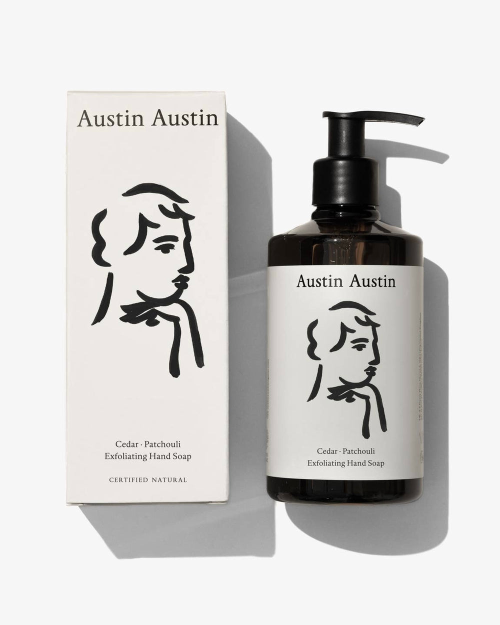 Austin Austin hand soap bottle and packaging flat lay on a white background
