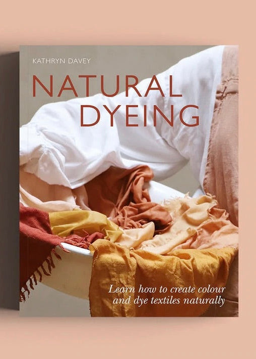 Book cover of 'Natural Dyeing' by Kathryn Davey with text and fabric swatches on a beige background