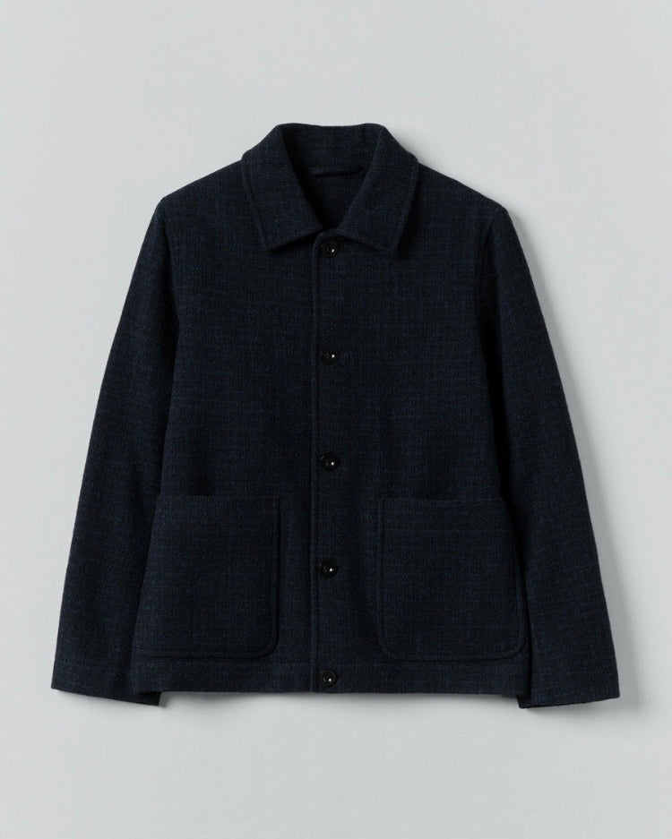 Dark gray jacket with button details on a light gray background